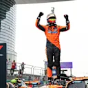 SHANGHAI, CHINA - MARCH 23: Race winner Oscar Piastri of Australia and McLaren celebrates in parc ferme during the F1 Grand Prix of China at Shanghai International Circuit on March 23, 2025 in Shanghai, China. (Photo by Bryn Lennon - Formula 1/Formula 1 via Getty Images)