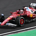 SHANGHAI, CHINA - MARCH 23: Charles Leclerc of Monaco driving the (16) Scuderia Ferrari SF-25 waves to fans on his way to parc ferme during the F1 Grand Prix of China at Shanghai International Circuit on March 23, 2025 in Shanghai, China. (Photo by Clive Mason/Getty Images)