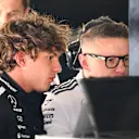 SHANGHAI, CHINA - MARCH 21: Andrea Kimi Antonelli of Italy and Mercedes AMG Petronas F1 Team talks with Peter Bonnington, Race Engineer of Mercedes AMG Petronas F1 Team in the garage during practice ahead of the F1 Grand Prix of China at Shanghai International Circuit on March 21, 2025 in Shanghai, China. (Photo by Mark Sutton - Formula 1/Formula 1 via Getty Images)