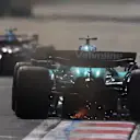 SHANGHAI, CHINA - MARCH 22: Sparks fly behind Lance Stroll of Canada driving the (18) Aston Martin F1 Team AMR25 Mercedes on track during qualifying ahead of the F1 Grand Prix of China at Shanghai International Circuit on March 22, 2025 in Shanghai, China. (Photo by Mark Thompson/Getty Images)