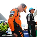 SHANGHAI, CHINA - MARCH 22: Third placed qualifier Lando Norris of Great Britain and McLaren and Second placed qualifier George Russell of Great Britain and Mercedes AMG Petronas F1 Team in parc ferme during qualifying ahead of the F1 Grand Prix of China at Shanghai International Circuit on March 22, 2025 in Shanghai, China. (Photo by Bryn Lennon - Formula 1/Formula 1 via Getty Images)