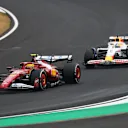 SUZUKA, JAPAN - APRIL 06: Lewis Hamilton of Great Britain driving the (44) Scuderia Ferrari SF-25 leads Isack Hadjar of France driving the (6) Visa Cash App Racing Bulls VCARB 02 on track during the F1 Grand Prix of Japan at Suzuka Circuit on April 06, 2025 in Suzuka, Japan. (Photo by Clive Rose/Getty Images)