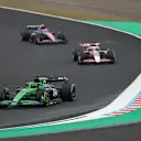 SUZUKA, JAPAN - APRIL 06: Nico Hulkenberg of Germany driving the (27) Kick Sauber C45 Ferrari leads Esteban Ocon of France driving the (31) Haas F1 VF-25 Ferrari and Jack Doohan of Australia driving the (7) Alpine F1 A525 Renault on track during the F1 Grand Prix of Japan at Suzuka Circuit on April 06, 2025 in Suzuka, Japan. (Photo by Clive Rose/Getty Images)