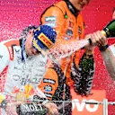 SUZUKA, JAPAN - APRIL 06: Race winner Max Verstappen of the Netherlands and Oracle Red Bull Racing and Hugh Bird, Race Engineer of Oracle Red Bull Racing celebrate on the podium with Champagne during the F1 Grand Prix of Japan at Suzuka Circuit on April 06, 2025 in Suzuka, Japan. (Photo by Clive Mason/Getty Images)