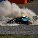 SUZUKA, JAPAN - APRIL 04: Fernando Alonso of Spain driving the (14) Aston Martin F1 Team AMR25 Mercedes spins across the gravel during practice ahead of the F1 Grand Prix of Japan at Suzuka Circuit on April 04, 2025 in Suzuka, Japan. (Photo by Rudy Carezzevoli/Getty Images)