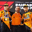 BAHRAIN, BAHRAIN - APRIL 13: Race winner Oscar Piastri of Australia and McLaren Andrea Stella, Team Principal of McLaren and Third placed Lando Norris of Great Britain and McLaren on the podium during the F1 Grand Prix of Bahrain at Bahrain International Circuit on April 13, 2025 in Bahrain, Bahrain. (Photo by Clive Rose/Getty Images)