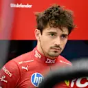 BAHRAIN, BAHRAIN - APRIL 11: Charles Leclerc of Monaco and Scuderia Ferrari looks on in the garage during practice ahead of the F1 Grand Prix of Bahrain at Bahrain International Circuit on April 11, 2025 in Bahrain, Bahrain. (Photo by Mark Sutton - Formula 1/Formula 1 via Getty Images)