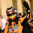 BAHRAIN, BAHRAIN - APRIL 12: Pole position qualifier Oscar Piastri of Australia and McLaren waves in parc ferme during qualifying ahead of the F1 Grand Prix of Bahrain at Bahrain International Circuit on April 12, 2025 in Bahrain, Bahrain. (Photo by Mark Sutton - Formula 1/Formula 1 via Getty Images)