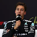 BAHRAIN, BAHRAIN - APRIL 12: Second placed qualifier George Russell of Great Britain and Mercedes AMG Petronas F1 Team in the Drivers Press Conference during qualifying ahead of the F1 Grand Prix of Bahrain at Bahrain International Circuit on April 12, 2025 in Bahrain, Bahrain. (Photo by Clive Rose/Getty Images)