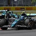 MONTREAL, QUEBEC - JUNE 15: Fernando Alonso of Spain driving the (14) Aston Martin F1 Team AMR25 Mercedes leads Lance Stroll of Canada driving the (18) Aston Martin F1 Team AMR25 Mercedes on track during the F1 Grand Prix of Canada at Circuit Gilles-Villeneuve on June 15, 2025 in Montreal, Quebec. (Photo by Mark Sutton - Formula 1/Formula 1 via Getty Images)