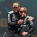 MONTREAL, QUEBEC - JUNE 15: Race winner George Russell of Great Britain and Mercedes AMG Petronas F1 Team and Third placed Andrea Kimi Antonelli of Italy and Mercedes AMG Petronas F1 Team celebrate on the podium during the F1 Grand Prix of Canada at Circuit Gilles-Villeneuve on June 15, 2025 in Montreal, Quebec. (Photo by Mark Thompson/Getty Images)