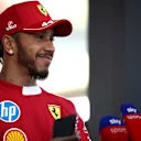 MONTREAL, QUEBEC - JUNE 14: Fifth placed qualifier Lewis Hamilton of Great Britain and Scuderia Ferrari is interviewed during qualifying ahead of the F1 Grand Prix of Canada at Circuit Gilles-Villeneuve on June 14, 2025 in Montreal, Quebec. (Photo by Jared C. Tilton - Formula 1/Formula 1 via Getty Images)