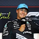 MONTREAL, QUEBEC - JUNE 14: Pole position qualifier George Russell of Great Britain and Mercedes AMG Petronas F1 Team in the Drivers Press Conference during qualifying ahead of the F1 Grand Prix of Canada at Circuit Gilles-Villeneuve on June 14, 2025 in Montreal, Quebec. (Photo by Clive Rose/Getty Images)