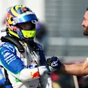 MONTREAL, QUEBEC - JUNE 14: Ninth placed qualifier Isack Hadjar of France and Visa Cash App Racing Bulls celebrates with a teammate in parc ferme during qualifying ahead of the F1 Grand Prix of Canada at Circuit Gilles-Villeneuve on June 14, 2025 in Montreal, Quebec. (Photo by Clive Rose/Getty Images)