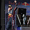 IMOLA, ITALY - MAY 18: Race winner Max Verstappen of the Netherlands and Oracle Red Bull Racing arrives on the podium during the F1 Grand Prix of Emilia-Romagna at Autodromo Internazionale Enzo e Dino Ferrari on May 18, 2025 in Imola, Italy. (Photo by Clive Rose/Getty Images)