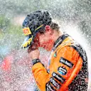 IMOLA, ITALY - MAY 18: Third placed Oscar Piastri of Australia and McLaren on the podium during the F1 Grand Prix of Emilia-Romagna at Autodromo Internazionale Enzo e Dino Ferrari on May 18, 2025 in Imola, Italy. (Photo by Bryn Lennon - Formula 1/Formula 1 via Getty Images)