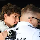 IMOLA, ITALY - MAY 17: Andrea Kimi Antonelli of Italy and Mercedes AMG Petronas F1 Team and Peter Bonnington, Race Engineer of Mercedes AMG Petronas F1 Team in the garage during final practice ahead of the F1 Grand Prix of Emilia-Romagna at Autodromo Internazionale Enzo e Dino Ferrari on May 17, 2025 in Imola, Italy. (Photo by Mark Sutton - Formula 1/Formula 1 via Getty Images)