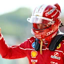 IMOLA, ITALY - MAY 17: Eleventh placed qualifier Charles Leclerc of Monaco and Scuderia Ferrari waves in the Pitlane during qualifying ahead of the F1 Grand Prix of Emilia-Romagna at Autodromo Internazionale Enzo e Dino Ferrari on May 17, 2025 in Imola, Italy. (Photo by Bryn Lennon - Formula 1/Formula 1 via Getty Images)