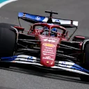 MIAMI, FLORIDA - MAY 04: Charles Leclerc of Monaco driving the (16) Scuderia Ferrari SF-25 heads to the grid during the F1 Grand Prix of Miami at Miami International Autodrome on May 04, 2025 in Miami, Florida. (Photo by Clive Rose/Getty Images)
