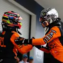 MIAMI, FLORIDA - MAY 04: Race winner Oscar Piastri of Australia and McLaren and Second placed Lando Norris of Great Britain and McLaren congratulate each other in parc ferme during the F1 Grand Prix of Miami at Miami International Autodrome on May 04, 2025 in Miami, Florida. (Photo by Bryn Lennon - Formula 1/Formula 1 via Getty Images)