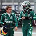 MIAMI, FLORIDA - MAY 04: Fifteenth placed Fernando Alonso of Spain and Aston Martin F1 Team and Sixteenth placed Lance Stroll of Canada and Aston Martin F1 Team talk in parc ferme during the F1 Grand Prix of Miami at Miami International Autodrome on May 04, 2025 in Miami, Florida. (Photo by Mark Thompson/Getty Images)