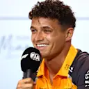 MIAMI, FLORIDA - MAY 01: Lando Norris of Great Britain and McLaren speaks in the Drivers Press Conference during previews ahead of the F1 Grand Prix of Miami at Miami International Autodrome on May 01, 2025 in Miami, Florida. (Photo by Clive Rose/Getty Images)