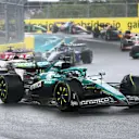 MIAMI, FLORIDA - MAY 03: Lance Stroll of Canada driving the (18) Aston Martin F1 Team AMR25 Mercedes leads Esteban Ocon of France driving the (31) Haas F1 VF-25 Ferrari and Pierre Gasly of France driving the (10) Alpine F1 A525 Renault on track during the Sprint ahead of the F1 Grand Prix of Miami at Miami International Autodrome on May 03, 2025 in Miami, Florida. (Photo by Clive Rose/Getty Images)