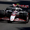 MONTE-CARLO, MONACO - MAY 25: Oliver Bearman of Great Britain driving the (87) Haas F1 VF-25 Ferrari heads to the grid prior to the F1 Grand Prix of Monaco at Circuit de Monaco on May 25, 2025 in Monte-Carlo, Monaco. (Photo by Clive Rose/Getty Images)