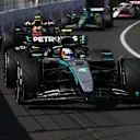 MONTE-CARLO, MONACO - MAY 25: Andrea Kimi Antonelli of Italy driving the (12) Mercedes AMG Petronas F1 Team W16 leads Yuki Tsunoda of Japan driving the (22) Oracle Red Bull Racing RB21 on track during the F1 Grand Prix of Monaco at Circuit de Monaco on May 25, 2025 in Monte-Carlo, Monaco. (Photo by Mark Thompson/Getty Images)