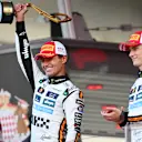 MONTE-CARLO, MONACO - MAY 25: Race winner Lando Norris of Great Britain and McLaren and Third placed Oscar Piastri of Australia and McLaren celebrate on the podium during the F1 Grand Prix of Monaco at Circuit de Monaco on May 25, 2025 in Monte-Carlo, Monaco. (Photo by Rudy Carezzevoli/Getty Images)