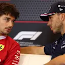 MONTE-CARLO, MONACO - MAY 22: Charles Leclerc of Monaco and Scuderia Ferrari talks with Pierre Gasly of France and Alpine F1 in the Drivers Press Conference during previews ahead of the F1 Grand Prix of Monaco at Circuit de Monaco on May 22, 2025 in Monte-Carlo, Monaco. (Photo by Clive Rose/Getty Images)