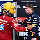 MONTE-CARLO, MONACO - MAY 24: Fourth placed qualifier Lewis Hamilton of Great Britain and Scuderia Ferrari and Fifth placed qualifier Max Verstappen of the Netherlands and Oracle Red Bull Racing talk in parc ferme during qualifying ahead of the F1 Grand Prix of Monaco at Circuit de Monaco on May 24, 2025 in Monte-Carlo, Monaco (Photo by Mark Sutton - Formula 1/Formula 1 via Getty Images)