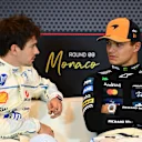 MONTE-CARLO, MONACO - MAY 24: Pole position qualifier Lando Norris of Great Britain and McLaren and Second placed qualifier Charles Leclerc of Monaco and Scuderia Ferrari talk in the Drivers Press Conference during qualifying ahead of the F1 Grand Prix of Monaco at Circuit de Monaco on May 24, 2025 in Monte-Carlo, Monaco (Photo by Mark Sutton - Formula 1/Formula 1 via Getty Images)