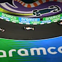 JEDDAH, SAUDI ARABIA - APRIL 20: Isack Hadjar of France driving the (6) Visa Cash App Racing Bulls VCARB 02 leads Lewis Hamilton of Great Britain driving the (44) Scuderia Ferrari SF-25 and Oliver Bearman of Great Britain driving the (87) Haas F1 VF-25 Ferrari on track during the F1 Grand Prix of Saudi Arabia at Jeddah Corniche Circuit on April 20, 2025 in Jeddah, Saudi Arabia. (Photo by Clive Mason/Getty Images)