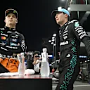 JEDDAH, SAUDI ARABIA - APRIL 19: Second placed qualifier Oscar Piastri of Australia and McLaren and Third placed qualifier George Russell of Great Britain and Mercedes AMG Petronas F1 Team talk in parc ferme during qualifying ahead of the F1 Grand Prix of Saudi Arabia at Jeddah Corniche Circuit on April 19, 2025 in Jeddah, Saudi Arabia. (Photo by Mark Sutton - Formula 1/Formula 1 via Getty Images)