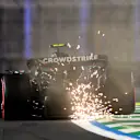 JEDDAH, SAUDI ARABIA - APRIL 19: Sparks fly behind Andrea Kimi Antonelli of Italy driving the (12) Mercedes AMG Petronas F1 Team W16 on track during qualifying ahead of the F1 Grand Prix of Saudi Arabia at Jeddah Corniche Circuit on April 19, 2025 in Jeddah, Saudi Arabia. (Photo by Clive Mason/Getty Images)