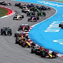 BARCELONA, SPAIN - JUNE 01: Max Verstappen of the Netherlands driving the (1) Oracle Red Bull Racing RB21 leads Lando Norris of Great Britain driving the (4) McLaren MCL39 Mercedes and the rest of the field at the start as Andrea Kimi Antonelli of Italy driving the (12) Mercedes AMG Petronas F1 Team W16 runs off track during the F1 Grand Prix of Spain at Circuit de Barcelona-Catalunya on June 01, 2025 in Barcelona, Spain. (Photo by Clive Rose - Formula 1/Formula 1 via Getty Images)