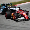 BARCELONA, SPAIN - JUNE 01: Charles Leclerc of Monaco driving the (16) Scuderia Ferrari SF-25 leads George Russell of Great Britain driving the (63) Mercedes AMG Petronas F1 Team W16 on track during the F1 Grand Prix of Spain at Circuit de Barcelona-Catalunya on June 01, 2025 in Barcelona, Spain. (Photo by James Sutton - Formula 1/Formula 1 via Getty Images)