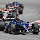 BARCELONA, SPAIN - JUNE 01: Alexander Albon of Thailand driving the (23) Williams FW47 Mercedes leads Oliver Bearman of Great Britain driving the (87) Haas F1 VF-25 Ferrari and Esteban Ocon of France driving the (31) Haas F1 VF-25 Ferrari on track during the F1 Grand Prix of Spain at Circuit de Barcelona-Catalunya on June 01, 2025 in Barcelona, Spain. (Photo by David Ramos/Getty Images)