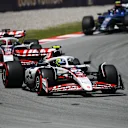 BARCELONA, SPAIN - JUNE 01: Oliver Bearman of Great Britain driving the (87) Haas F1 VF-25 Ferrari leads Esteban Ocon of France driving the (31) Haas F1 VF-25 Ferrari on track during the F1 Grand Prix of Spain at Circuit de Barcelona-Catalunya on June 01, 2025 in Barcelona, Spain. (Photo by James Sutton - Formula 1/Formula 1 via Getty Images)