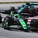 BARCELONA, SPAIN - JUNE 01: Nico Hulkenberg of Germany driving the (27) Kick Sauber C45 Ferrari leads Fernando Alonso of Spain driving the (14) Aston Martin F1 Team AMR25 Mercedes on track during the F1 Grand Prix of Spain at Circuit de Barcelona-Catalunya on June 01, 2025 in Barcelona, Spain. (Photo by Clive Rose - Formula 1/Formula 1 via Getty Images)
