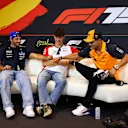 BARCELONA, SPAIN - MAY 29: Carlos Sainz of Spain and Williams, Oliver Bearman of Great Britain and Haas F1 and Lando Norris of Great Britain and McLaren in the Drivers Press Conference during previews ahead of the F1 Grand Prix of Spain at Circuit de Barcelona-Catalunya on May 29, 2025 in Barcelona, Spain. (Photo by Clive Rose/Getty Images)