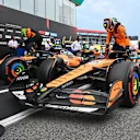 BARCELONA, SPAIN - MAY 31: Pole position qualifier Oscar Piastri of Australia and McLaren and Second placed qualifier Lando Norris of Great Britain and McLaren arrive in parc ferme during qualifying ahead of the F1 Grand Prix of Spain at Circuit de Barcelona-Catalunya on May 31, 2025 in Barcelona, Spain. (Photo by Mark Sutton - Formula 1/Formula 1 via Getty Images)