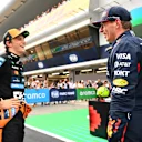 BARCELONA, SPAIN - MAY 31: Pole position qualifier Oscar Piastri of Australia and McLaren and Third placed qualifier Max Verstappen of the Netherlands and Oracle Red Bull Racing talk in parc ferme during qualifying ahead of the F1 Grand Prix of Spain at Circuit de Barcelona-Catalunya on May 31, 2025 in Barcelona, Spain. (Photo by Mark Sutton - Formula 1/Formula 1 via Getty Images)