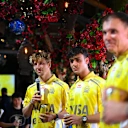 MIAMI, FLORIDA - APRIL 29: Liam Lawson of New Zealand and Visa Cash App Racing Bulls, Peter Bayer,