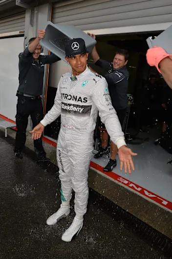 Lewis Hamilton (GBR) Mercedes AMG F1 takes the ice bucket challenge following his nomination by
