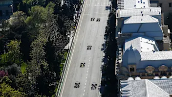 BAKU CITY CIRCUIT, AZERBAIJAN - APRIL 28: Daniil Kvyat, Toro Rosso STR14, leads Kevin Magnussen,
