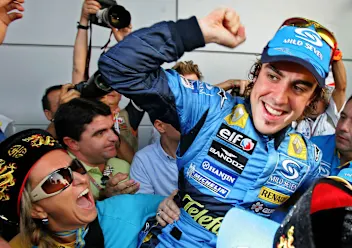 SHANGHAI, CHINA - OCTOBER 16:  (CHINA OUT) Fernando Alonso of Spain and Renault (R) celebrates