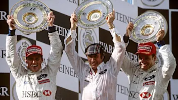Johnny Herbert, Jackie Stewart, Rubens Barrichello, Grand Prix of Europe, Nurburgring, 26 September 1999. (Photo by Paul-Henri Cahier /Getty Images)