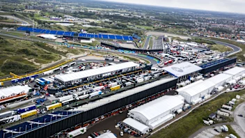 A drone photograph taken on August 31, 2021 shows an aerial view of the different Formula 1 teams